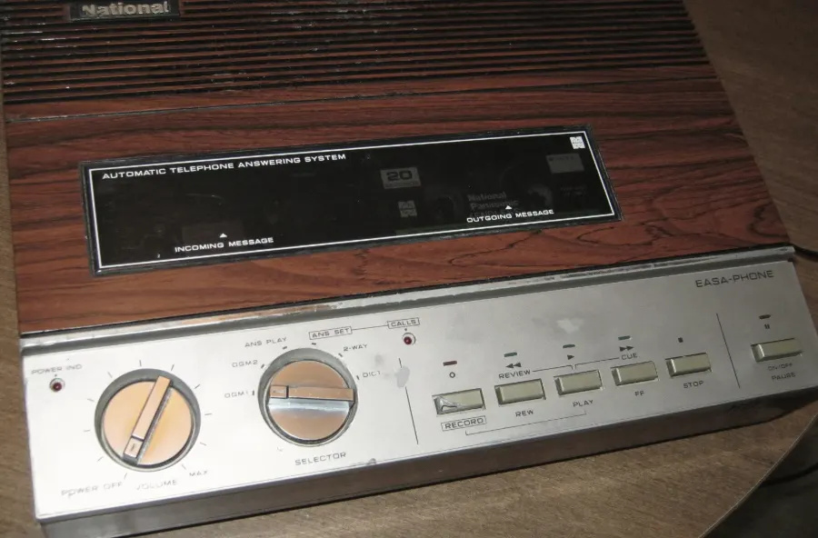 A 1970s Panasonic answering machine with wood-grain case